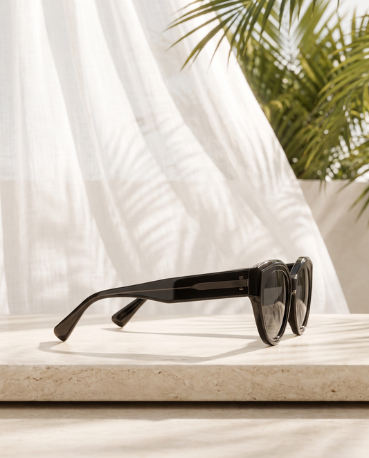 Held Gaze — ILKARA black cat-eye sunglasses, side profile view